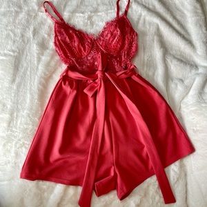 Cute pink/peach romper from the Boutique!